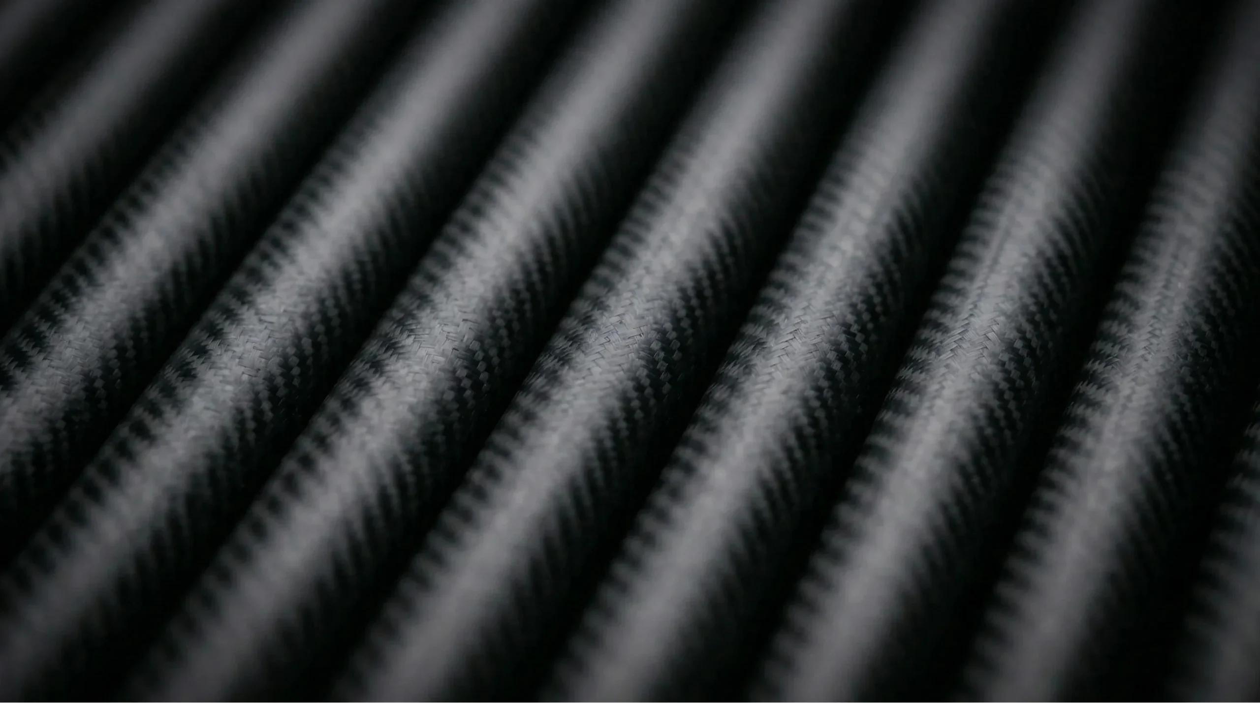 Detalle del tejido de fibra de carbono del tubo Velmos